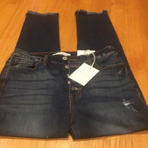 Women’s New with tags but no price. Dark den frayed hem slight distressing